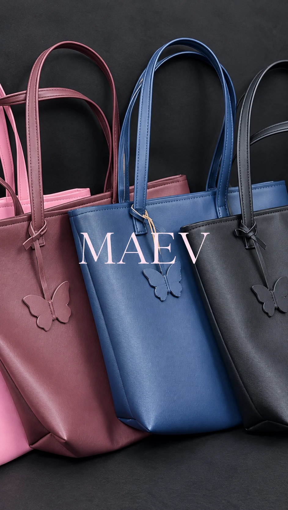 Wine, blue and black MAEV totes side by side with the MAEV wordmark